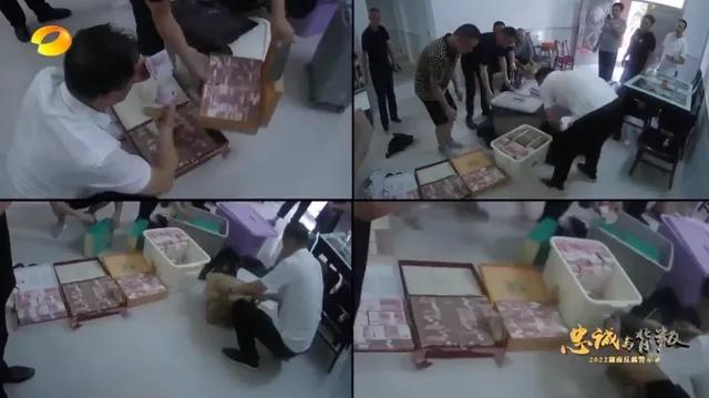 傅国平家查抄现场：现金成箱烟酒如山 （5台点钞机数5小时）